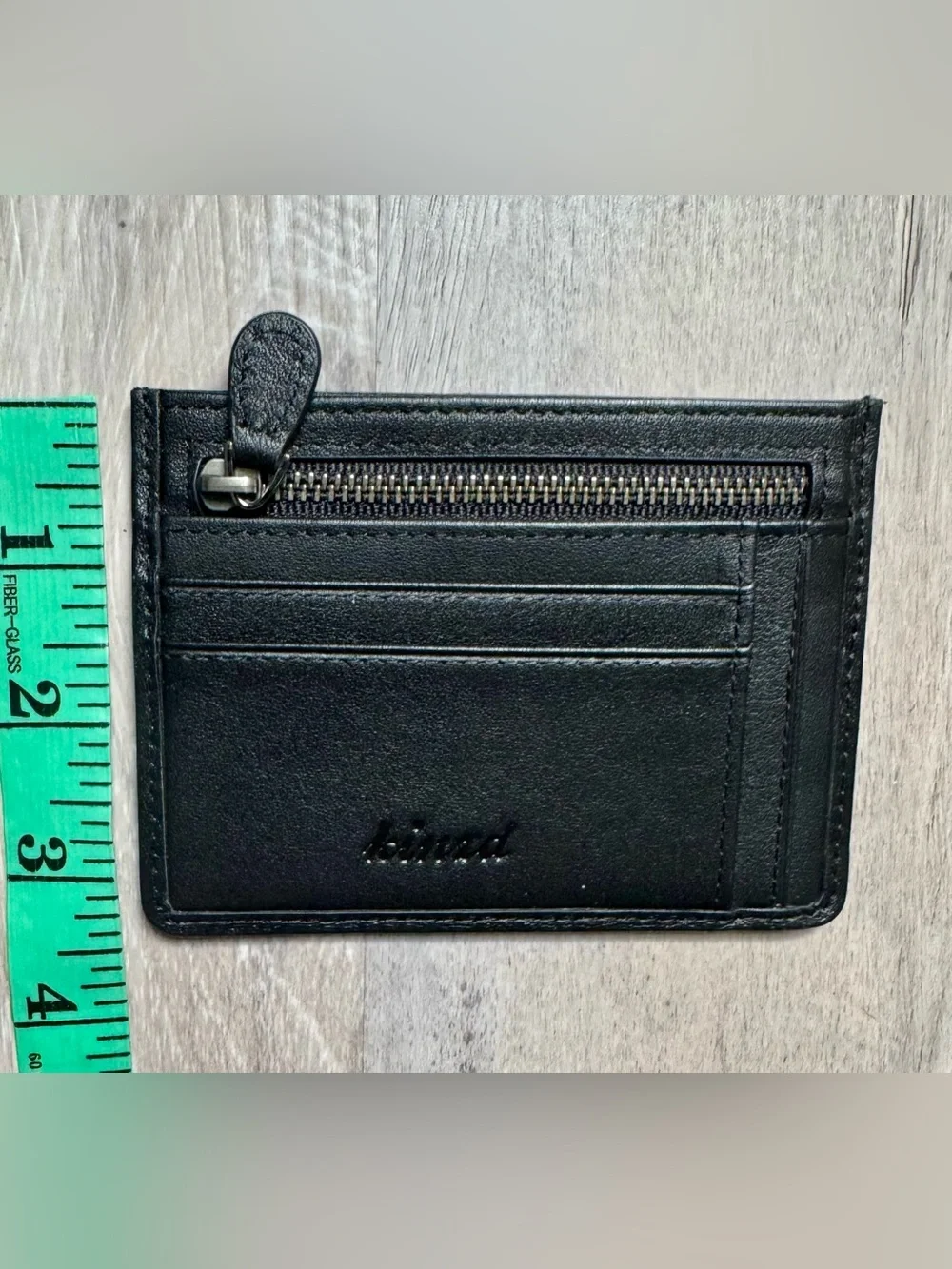 Kinzd minimalist leather card holder by Kinzd, featuring a zippered compartment